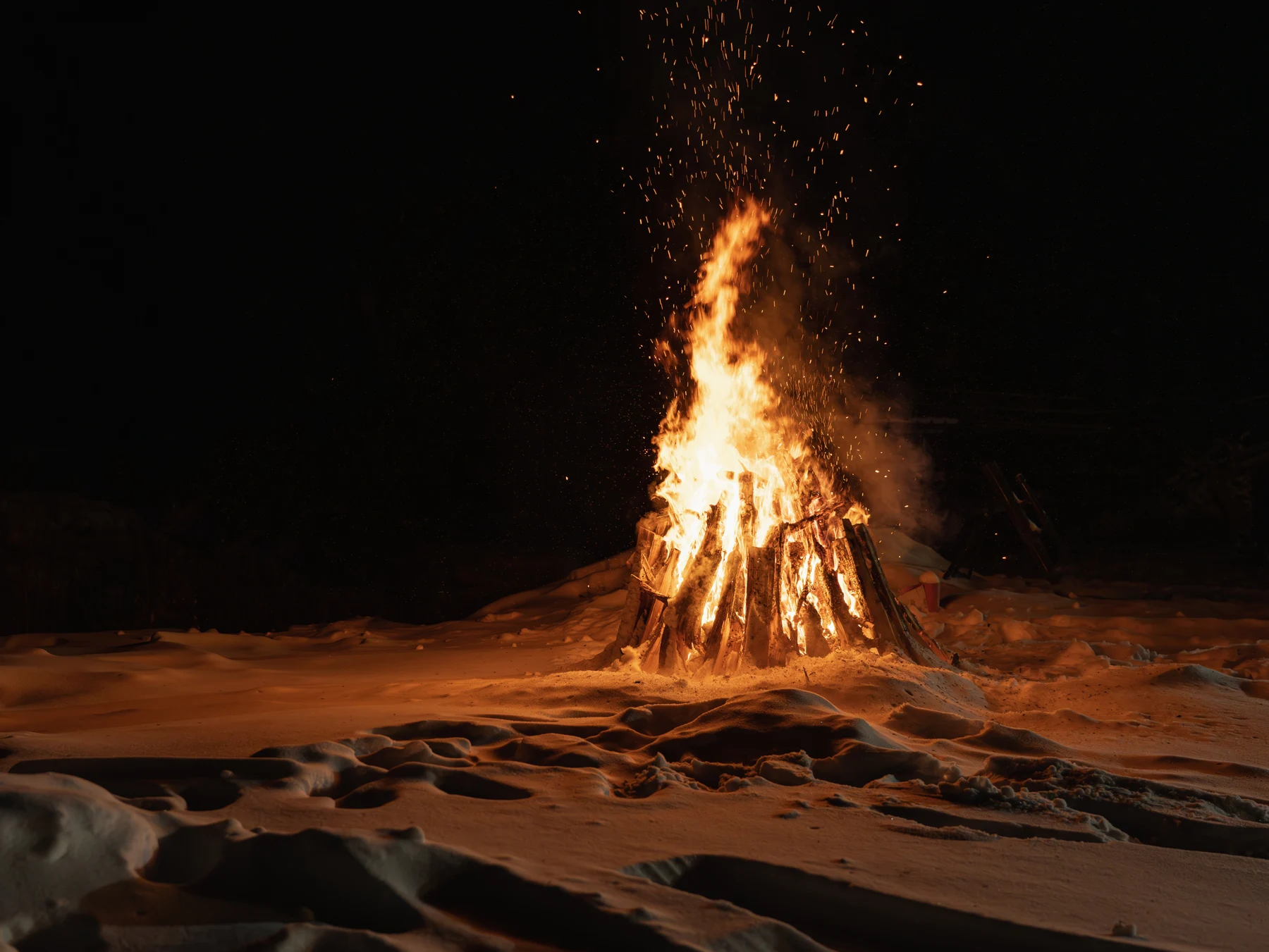 A bonfire against a dark background.