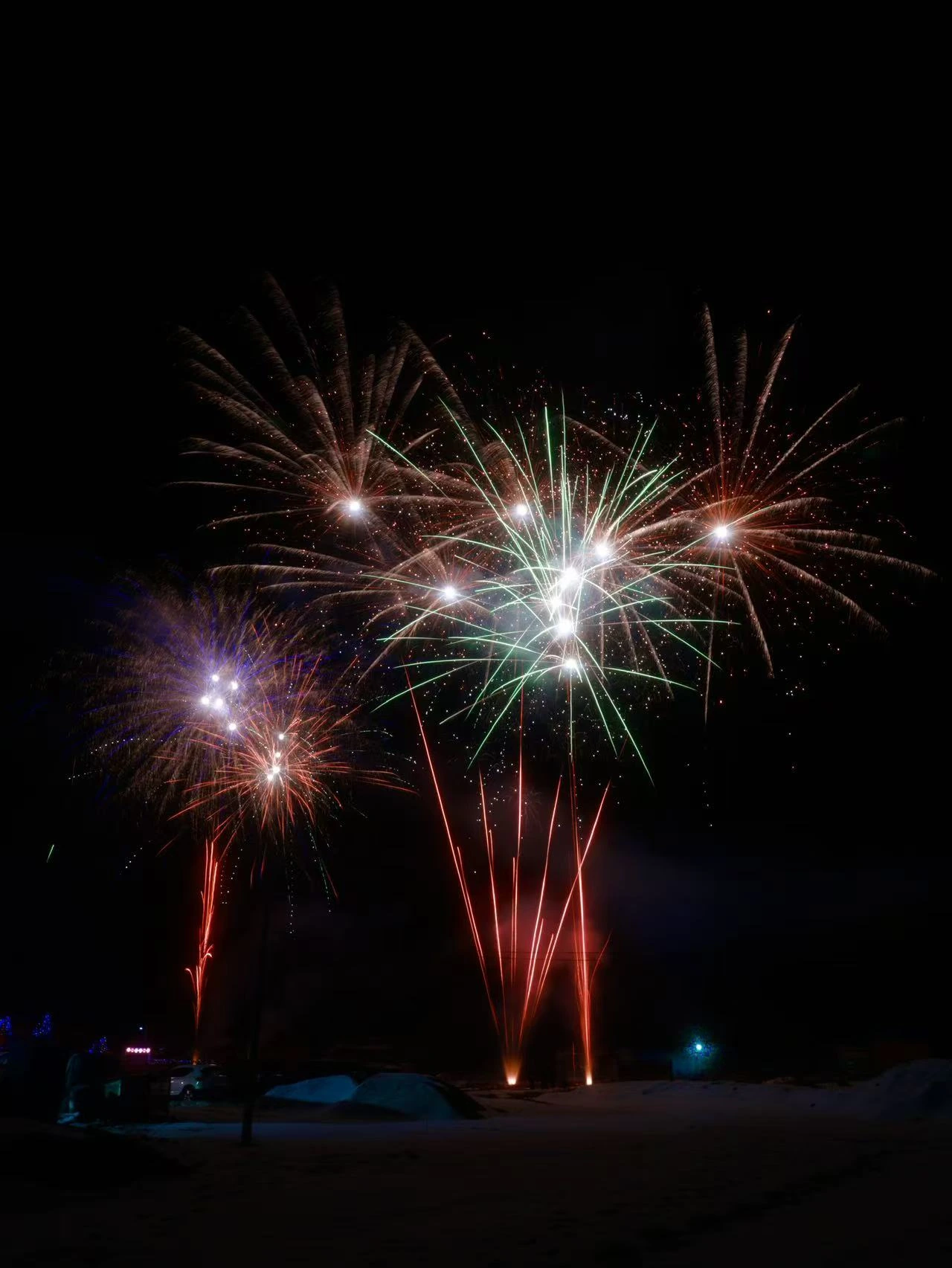 Fireworks against a dark night sky.